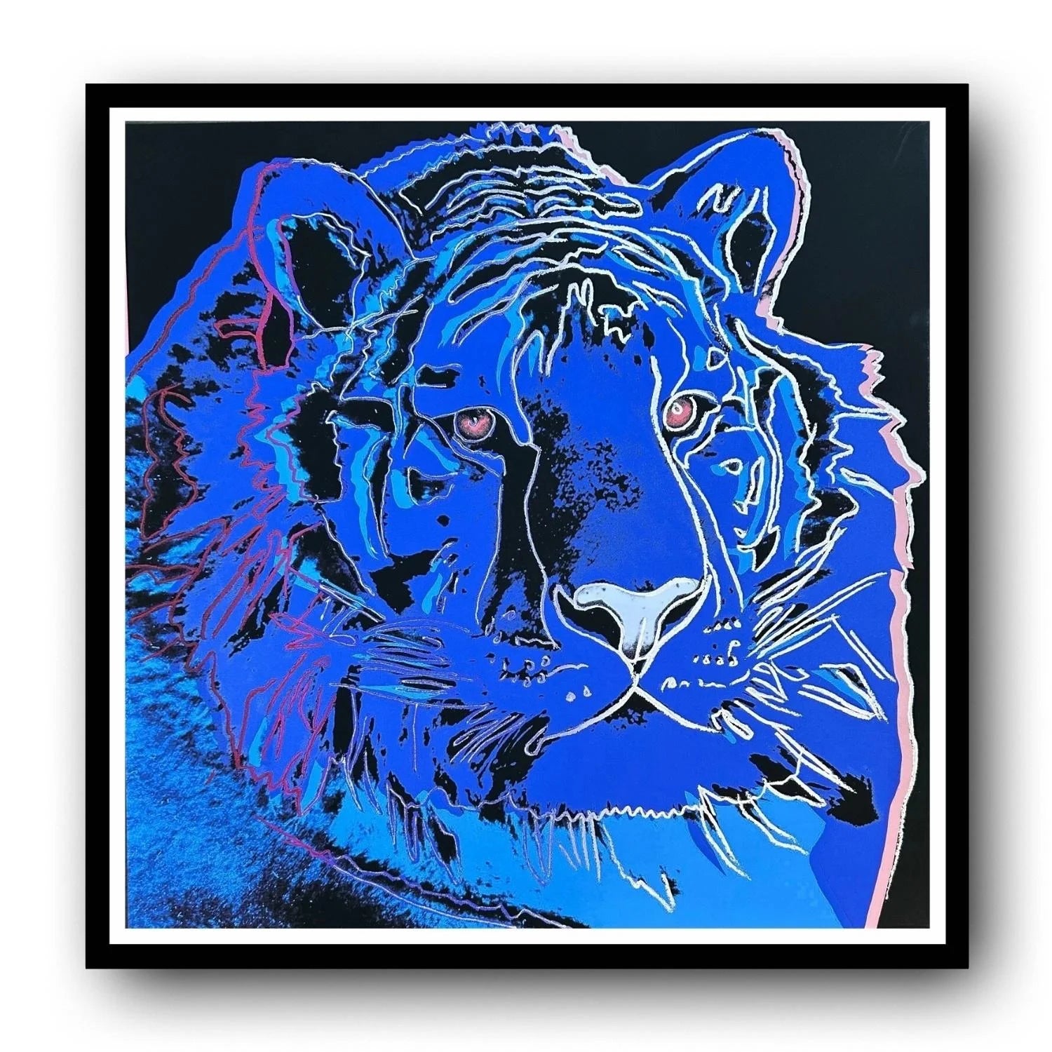 Framed artwork of a stylized tiger head in blue and black.